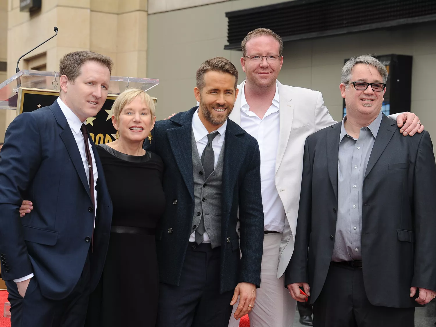 Ryan Reynolds and brothers pose for a photo as Reynolds is honored with a star on the Hollywood Walk of Fame