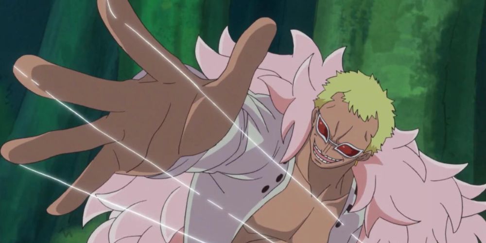 Donquixote Doflamingo using the powers of the Ito Ito no Mi.