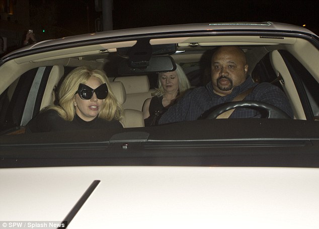 And she's off: Gaga was without her handsome fiance Taylor Kinney for the night out