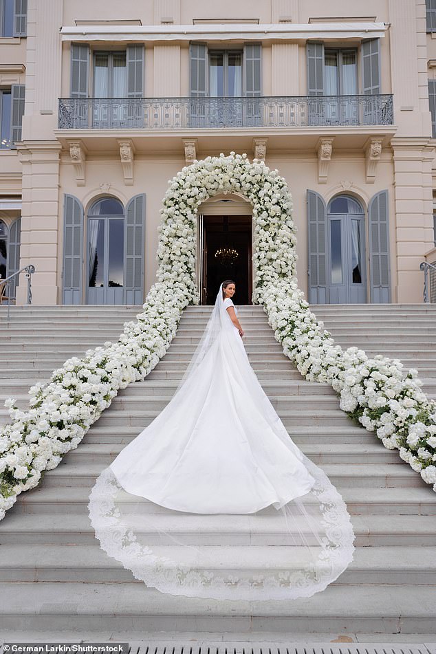 Nada poses for pictures in her stunning dress outside the exclusive Hotel du Cap-Eden-Roc