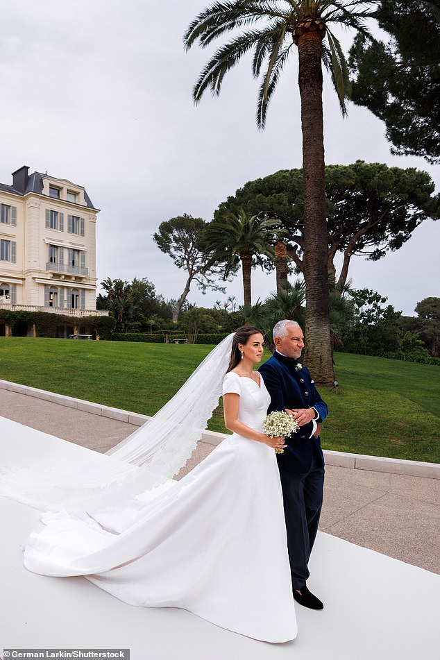 Nada is pictured preparing to walk down the aisle in her beautiful Dior wedding dress