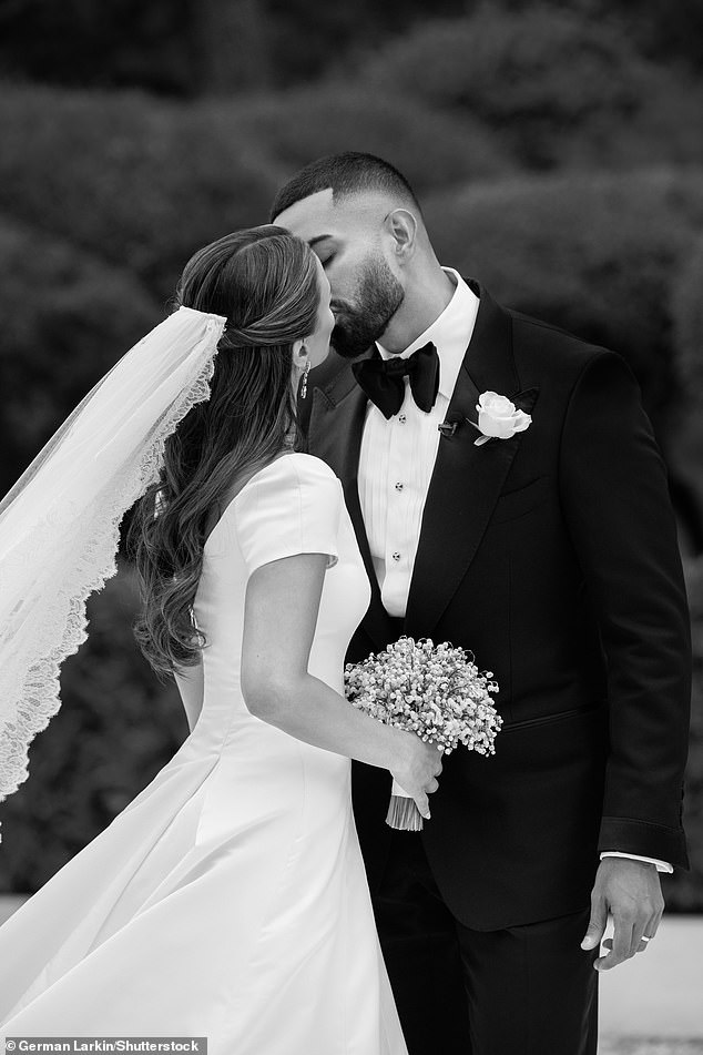 The newlyweds shared a sweet kiss outside the Hotel du Cap-Eden-Roc