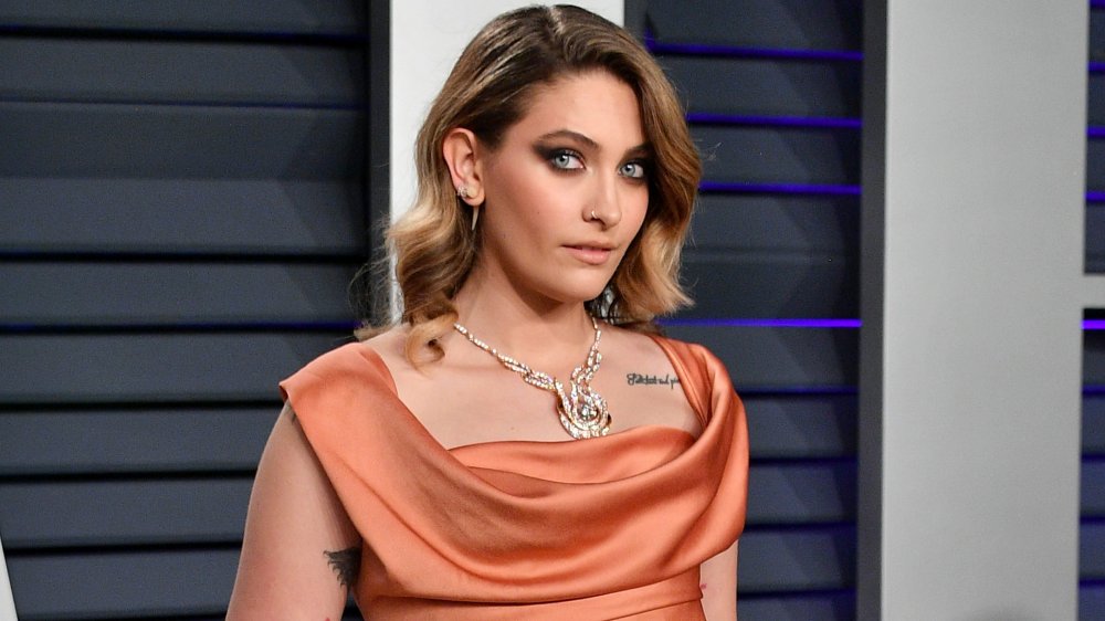 Paris Jackson in a peach colored off-shoulder dress