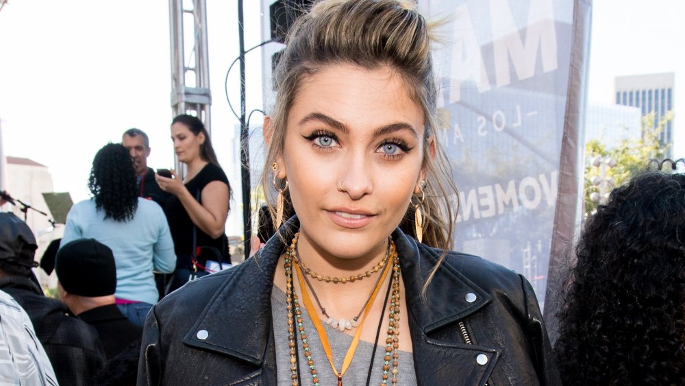 Paris Jackson with hair pulled back in ponytail