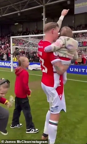 The Irish midfielder gave the Wrexham supporters the thumbs up as they sang his song