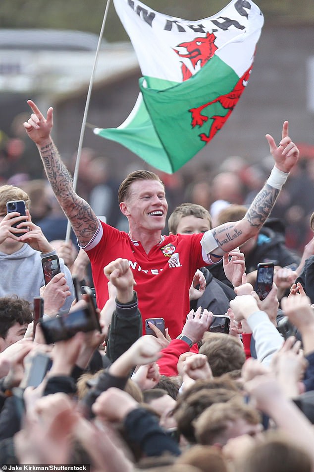 McClean was celebrating with the Wrexham fans after they earned promotion at the weekend