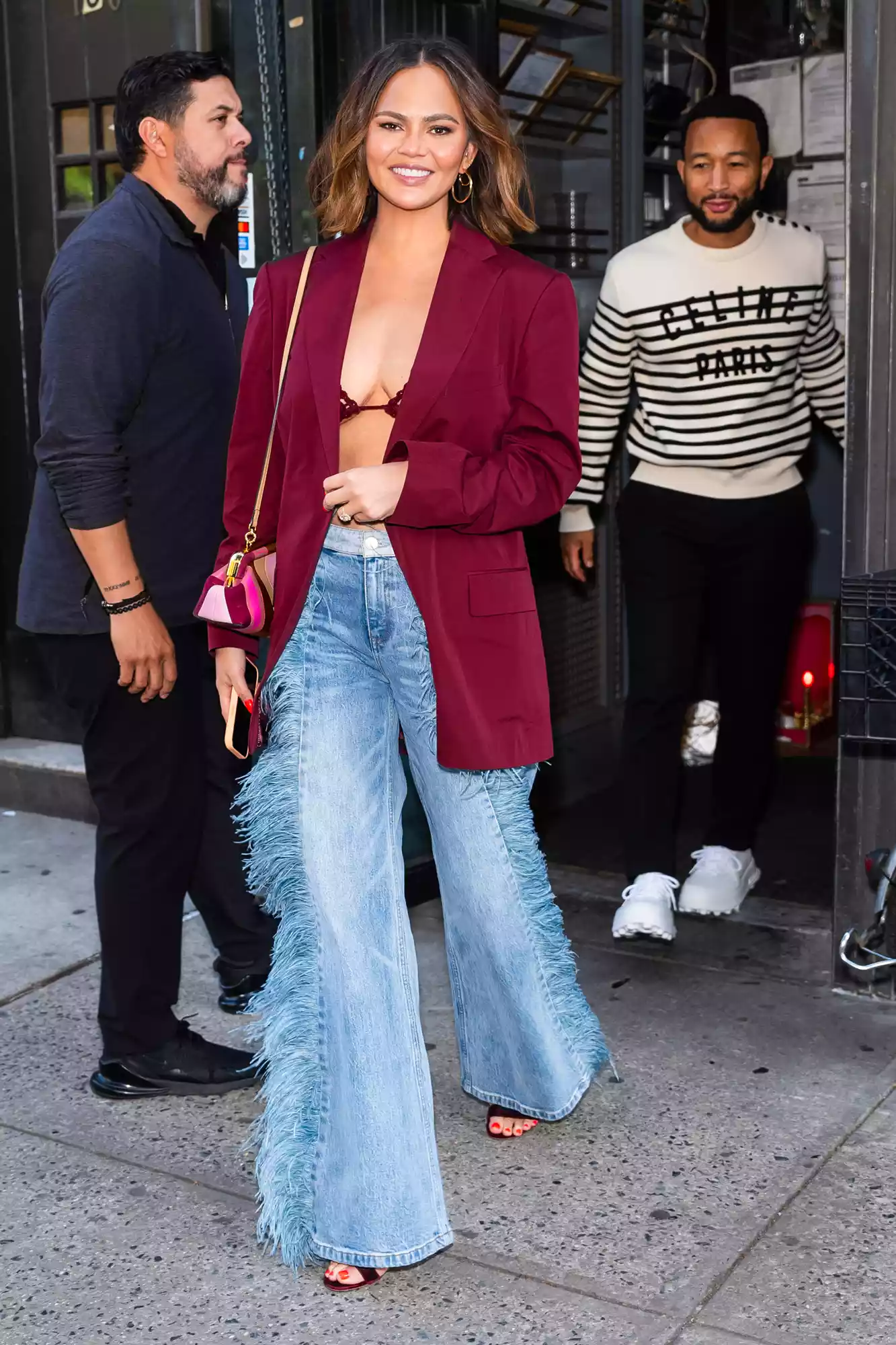 Chrissy Teigen (L) and John Legend are seen in Greenwich Village on May 03, 2024 in New York City. 