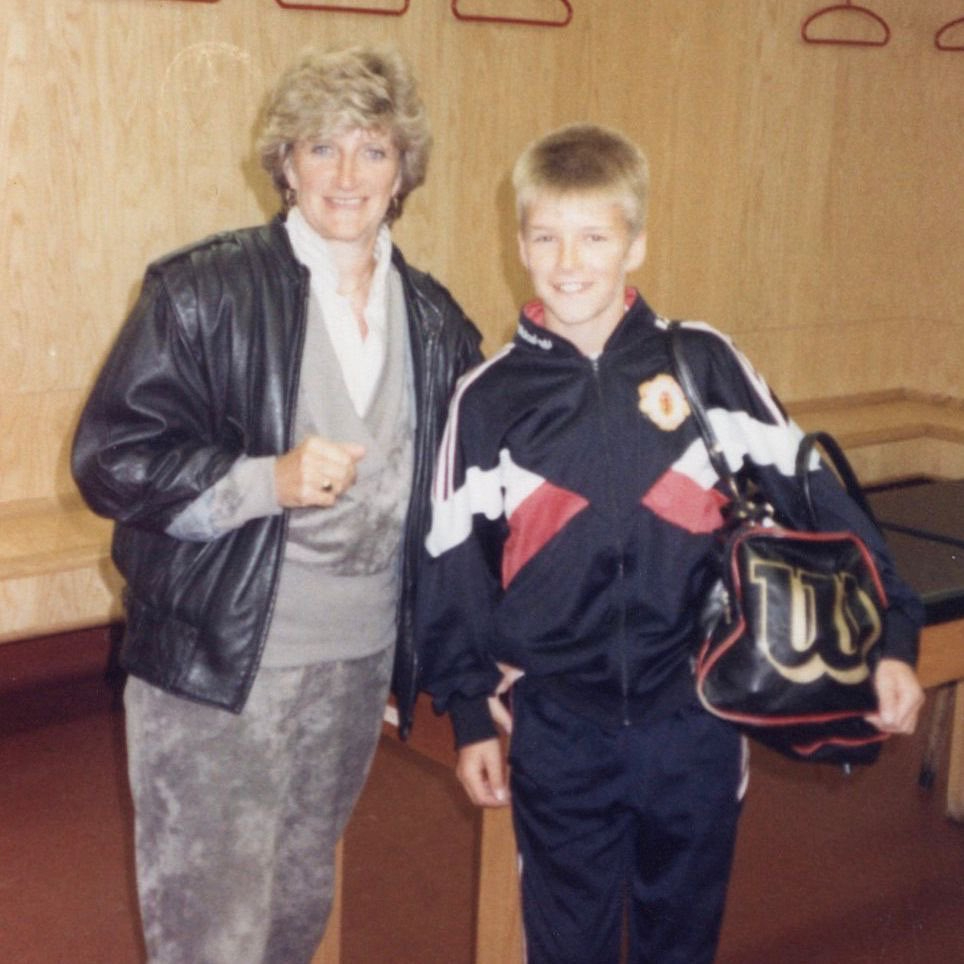 Sandra and David pose for a photo together when the footballer was starting out at United