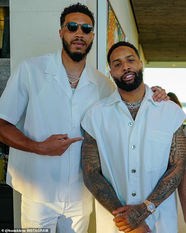 The athletes: Basketball star Jayson Tatum, 24, was seen posing with Odell Beckham Jr, 29