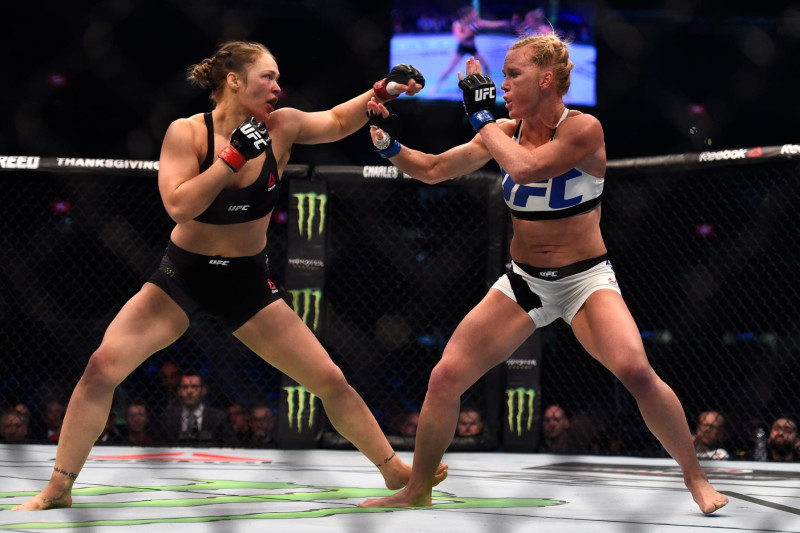 MELBOURNE, AUSTRALIA - NOVEMBER 15: (L-R) Ronda Rousey faces Holly Holm in their UFC women's bantamweight championship bout during the UFC 193 event at Etihad Stadium on November 15, 2015 in Melbourne, Australia. (Photo by Jeff Bottari/Zuffa LLC/Zuffa LLC via Getty Images)