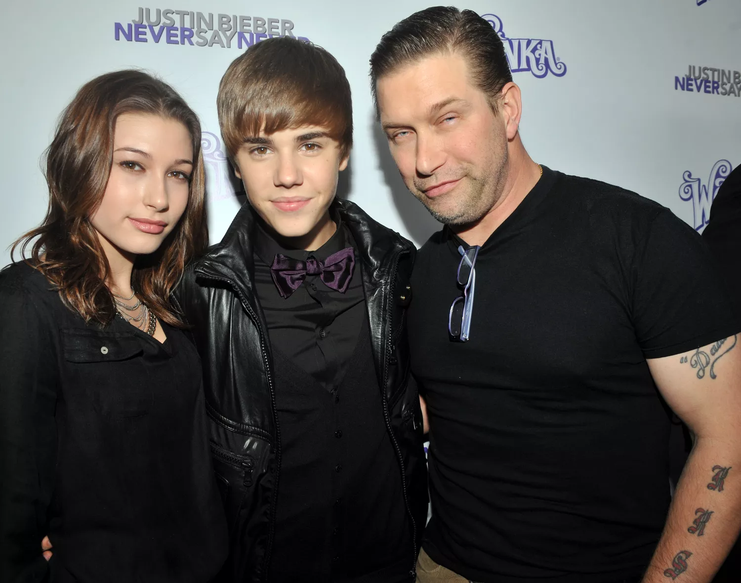 Hailey and Steven Baldwin pose with Justin Bieber at his "Never Say Never" premiere