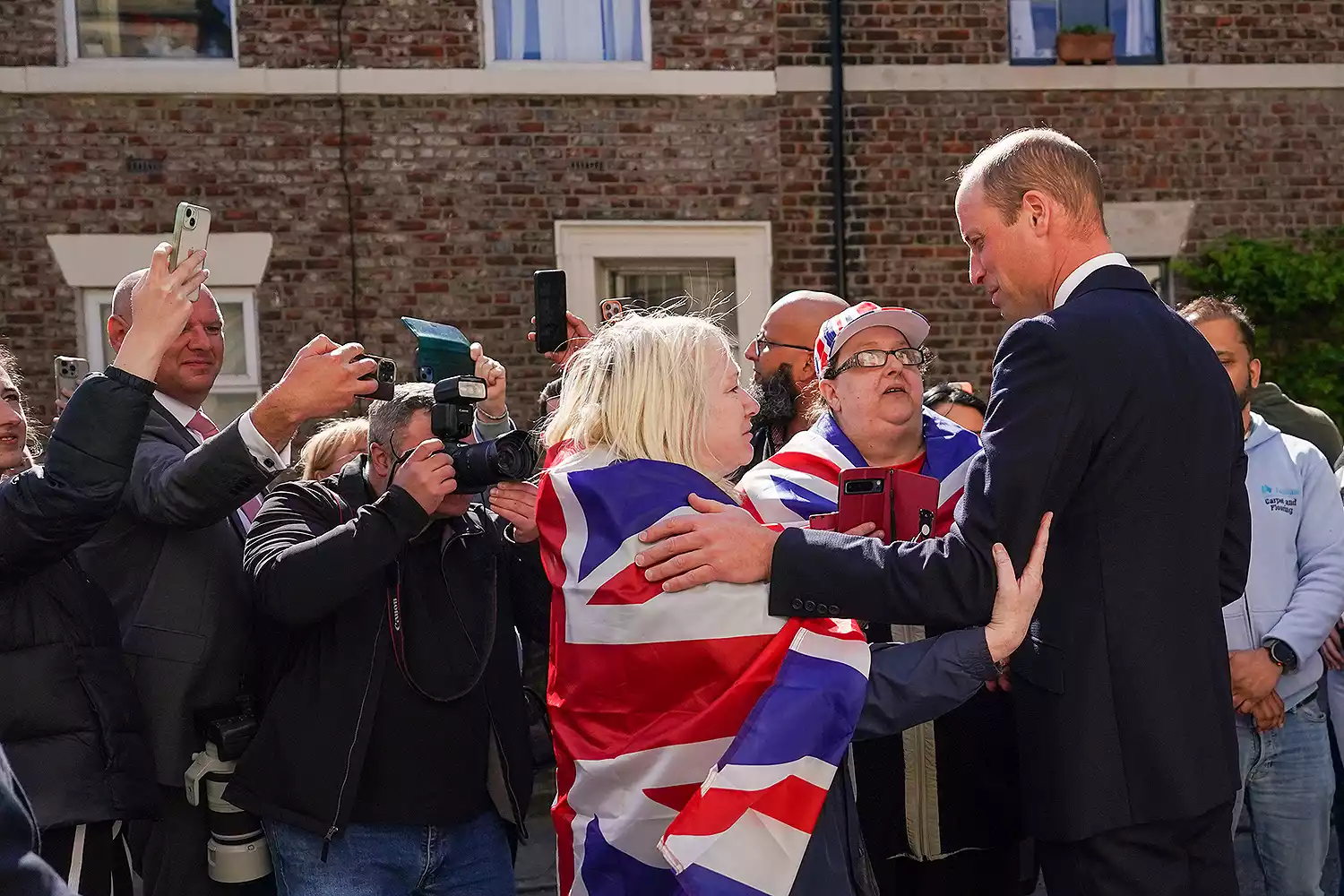 Prince William, Prince of Wales speaks with well wishers after he visits James' Place Newcastle