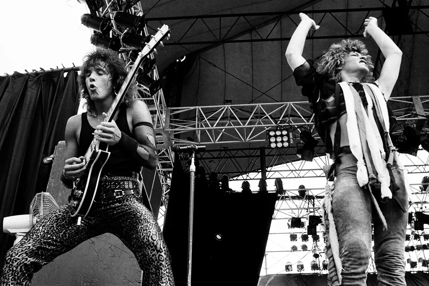 Jon Bon Jovi and Richie Sambora of Bon Jovi perform on stage at Nagoya Stadium for Super Rock '84, 4th August 1984, Tokyo, Japan