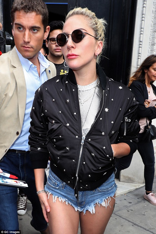 Wrapping up: Mother Monster later threw on a black studded bomber jacket 