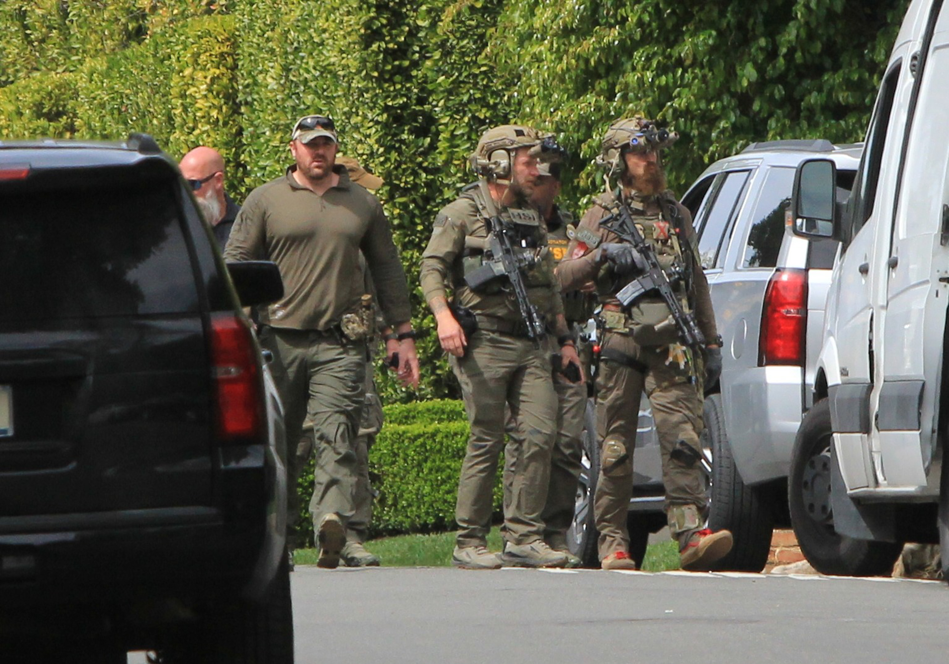 feds with guns outside of diddy's house