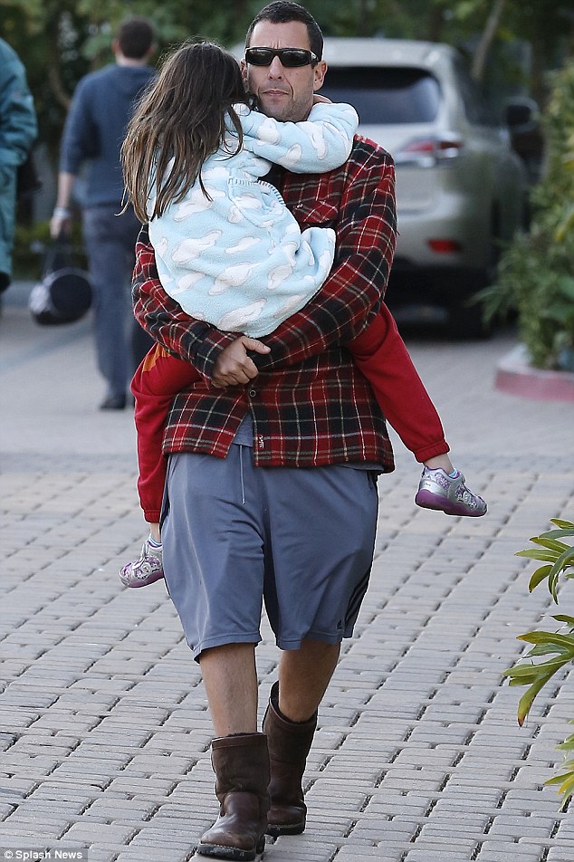 A boot-iful site: The self-styled funnyman showcased his manly calves with an unconventional shorts and boots combo