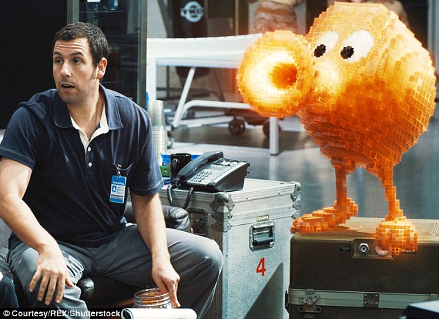 Pixel perfect: He may have been upstaged in the acting stakes by Q*bert but Adam's film was a box office hit