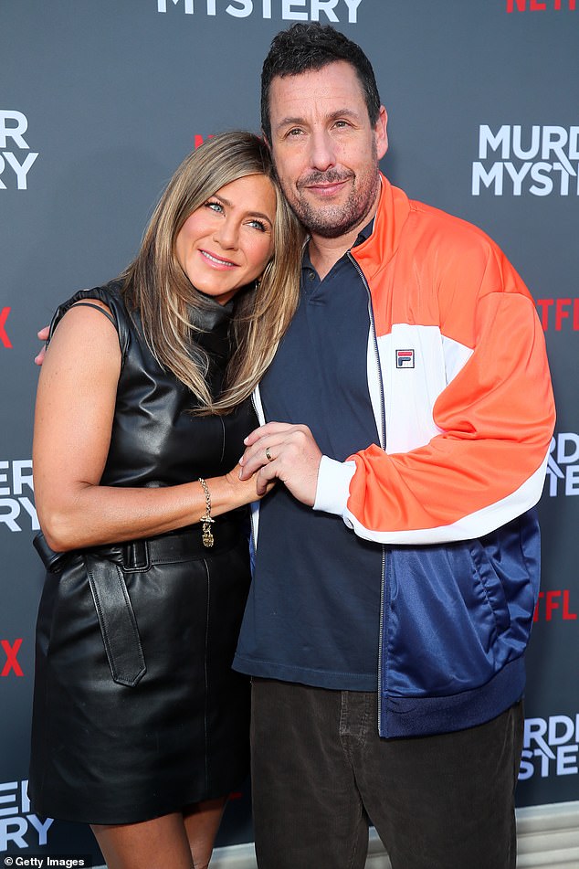 His take: Sandler made a confession of his own and said kissing his longtime friend on camera wasn't all that awkward, with the exception when his wife Jackie and children were on set