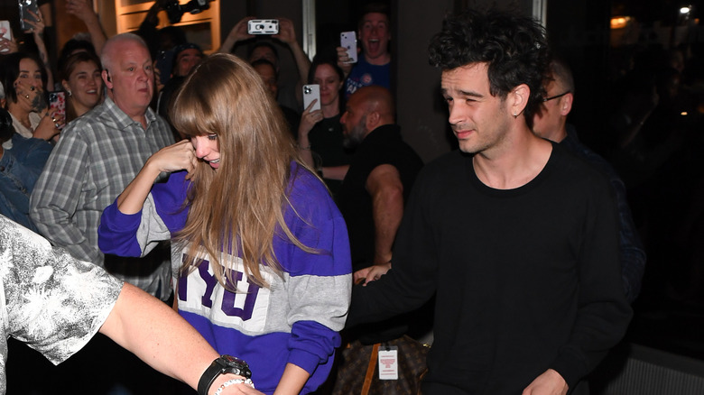 Taylor Swift walking with Matty Healy