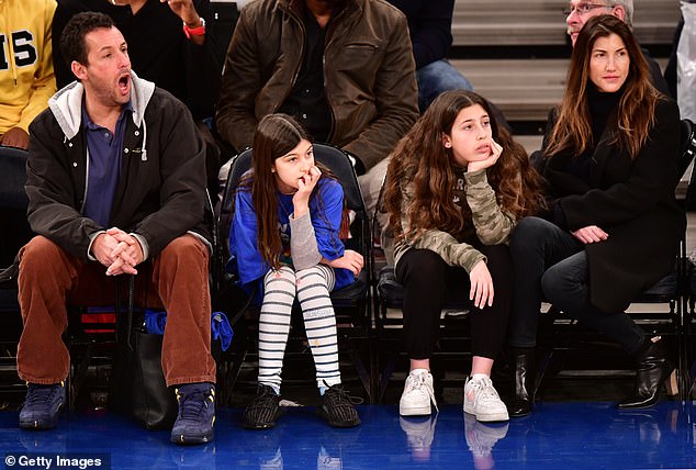 At play: Sadie and Sunny seen with their parents at a basketball game in 2018 in NYC