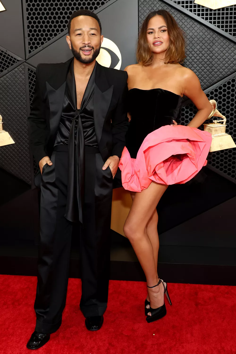 John Legend and Chrissy Teigen attend the 66th GRAMMY Awards at Crypto.com Arena on February 04, 2024 in Los Angeles, California.