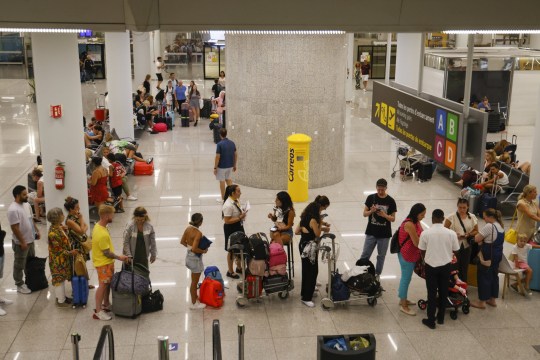 Mandatory Credit: Photo by CATI CLADERA/EPA-EFE/Shutterstock (14071551e) Tourists wait at the airport of Palma for their return flight to Italy due to poor weather conditions in Italy at the Son Sant Joan airport in Mallorca, Spain, 28 August 2023. Poor weather in Italy leaves hundreds stranded at Mallorca airport, Palma De Mallorca, Spain - 28 Aug 2023