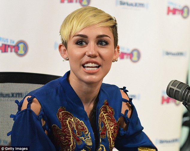 Bright-eyed and bushy-tailed: Miley looked ready for the day after getting a lot of sleep the night before