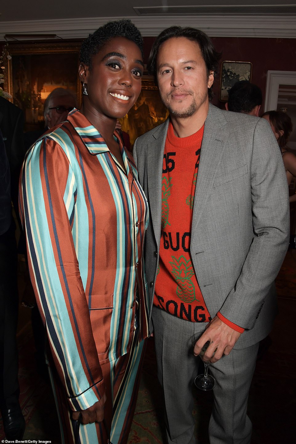 Cheers: Lashana smiled wide for a photo with Cary Joji Fukunaga