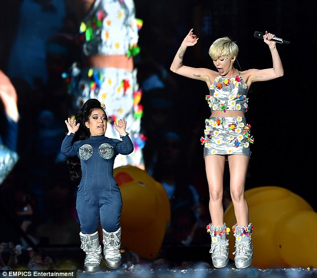 Jump for joy: Athletic Miley bounced around the stage