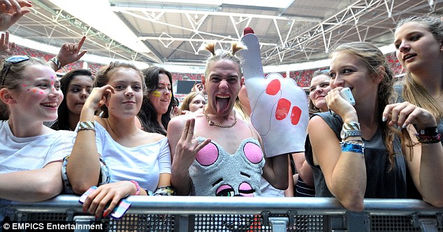 Excited: One fan dressed up as Miley for the occasion, clearly very excited to see his idol in action