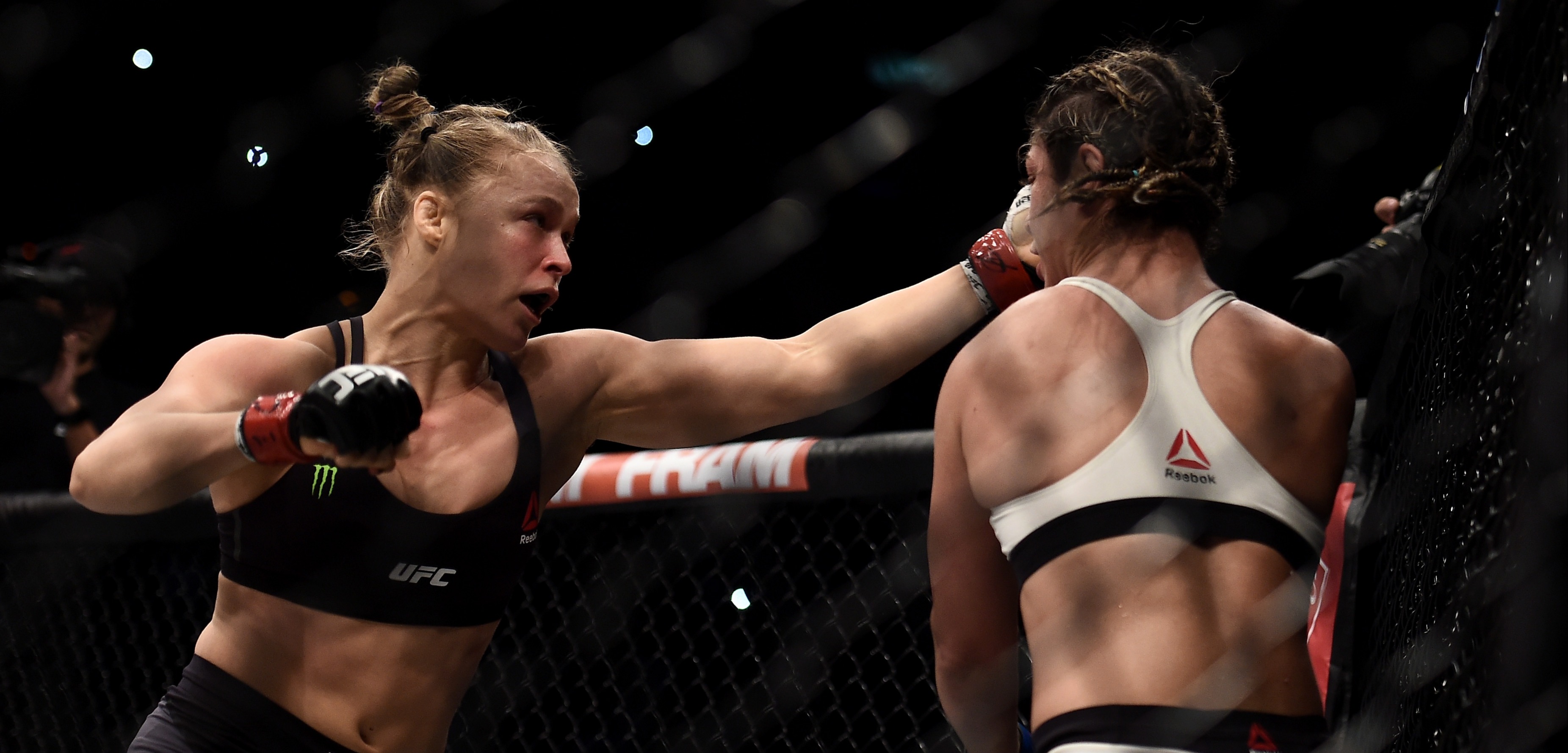 Rousey trapped Correia against the fence and knocked her out cold