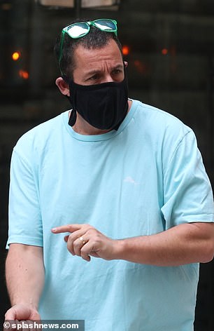 Safety: The actor honoured Czech Republic's Covid-19 government face mask regulations and wore a black mask when fans approached him