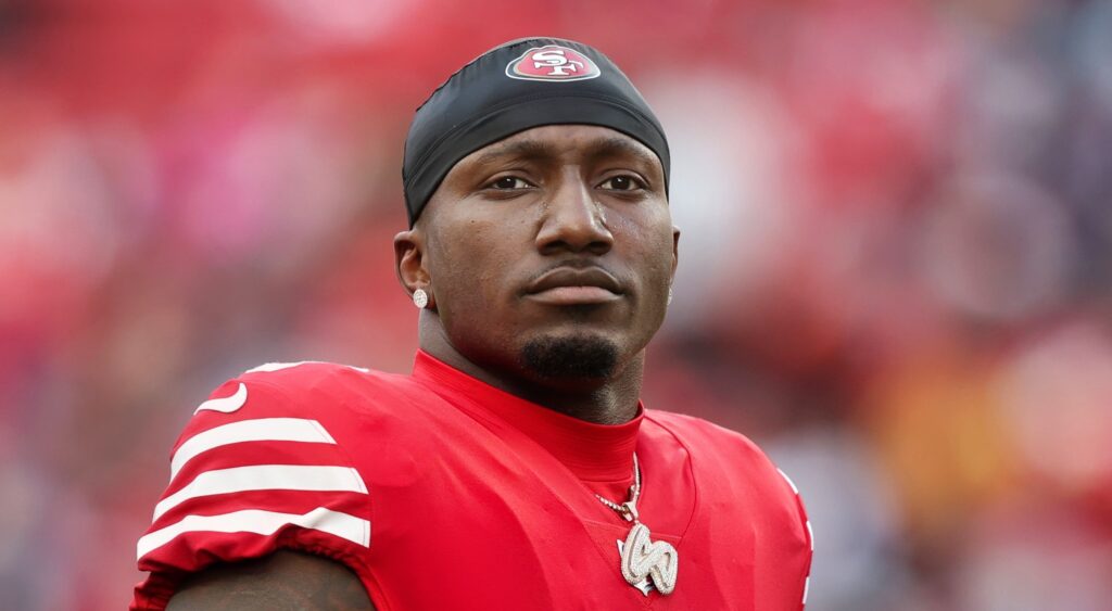 Deebo Samuel of San Francisco 49ers looking on.