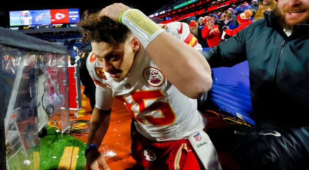 Patrick Mahomes ducking from snowballs 