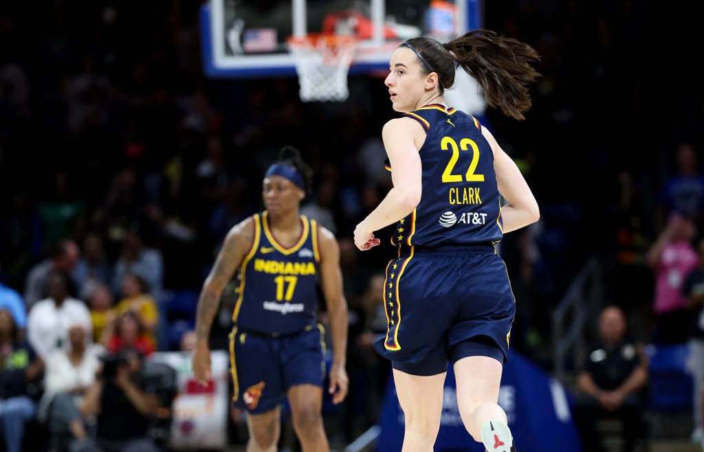 Indiana Fever guard Caitlin Clark (22) reacts during the first quarter against the Dallas Wings at College Park Center.