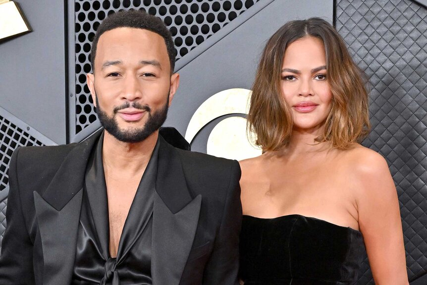 John Legend and Chrissy Teigen attend the 2024 grammys red carpet