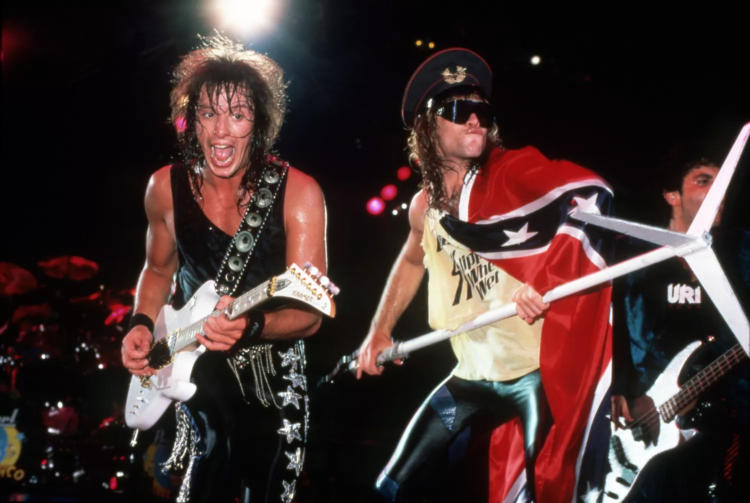 Lead guitarist Richie Sambora and lead vocalist and band namesake Jon Bon Jovi perform on June 22, 1985, at Hart Plaza in Detroit, MI.