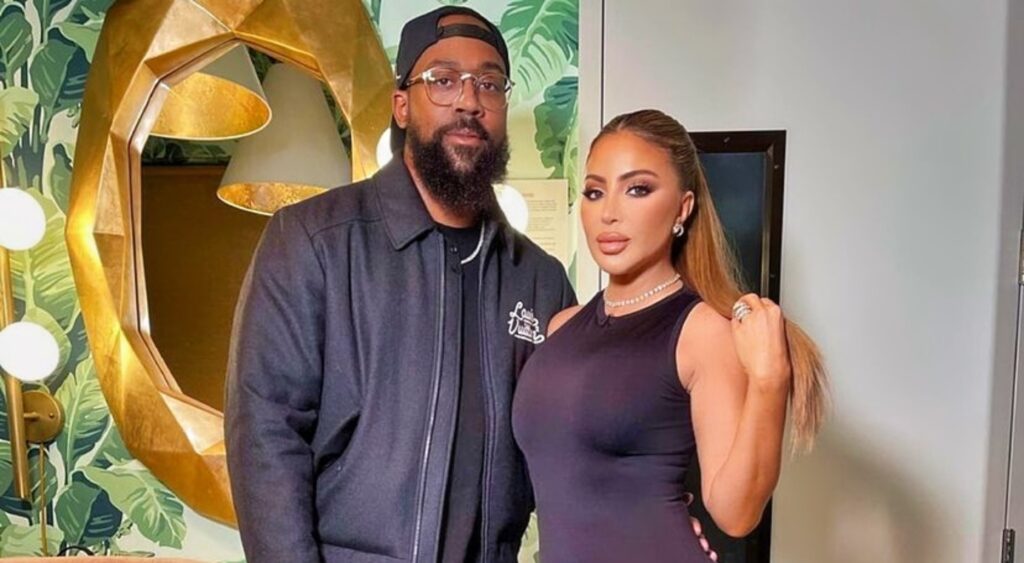 Marcus Jordan and Larsa Pippen posing