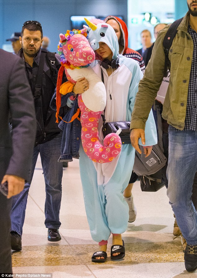 Can't be tamed! The We Can't Stop singer looked exhausted walking through Sydney Airport on Friday