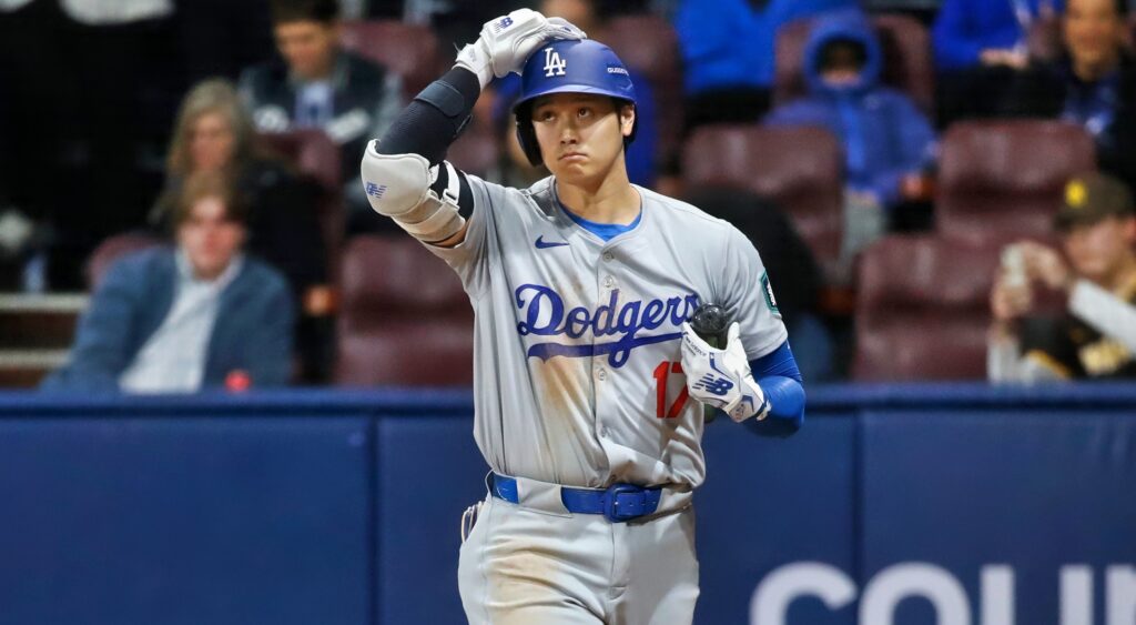 Shohei Ohtani with hand on helmet