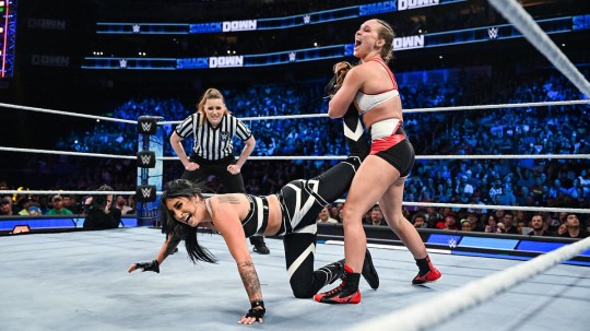 Ronda Rousey puts Sonya Deville in an ankle lock on WWE SmackDown