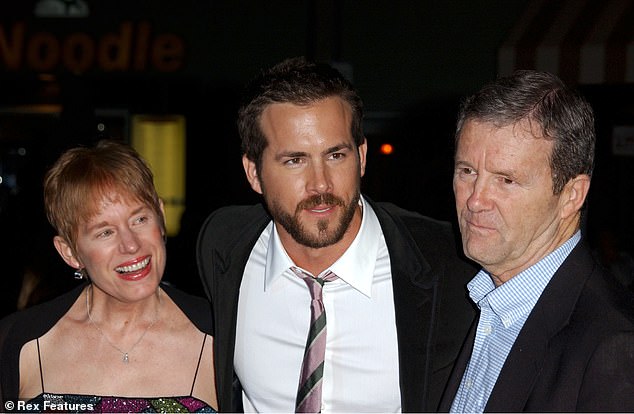 Ryan pictured with mom Tammy and dad Jim in November 2005 - Jim died in 2015