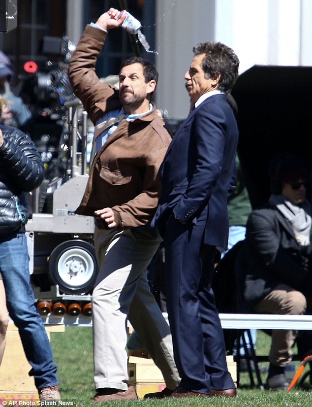 Tossing a drink: Adam Sandler, 49,  appeared to be in a bit of a rage as he filmed scenes alongside co-star Ben Stiller, 50, in New York City