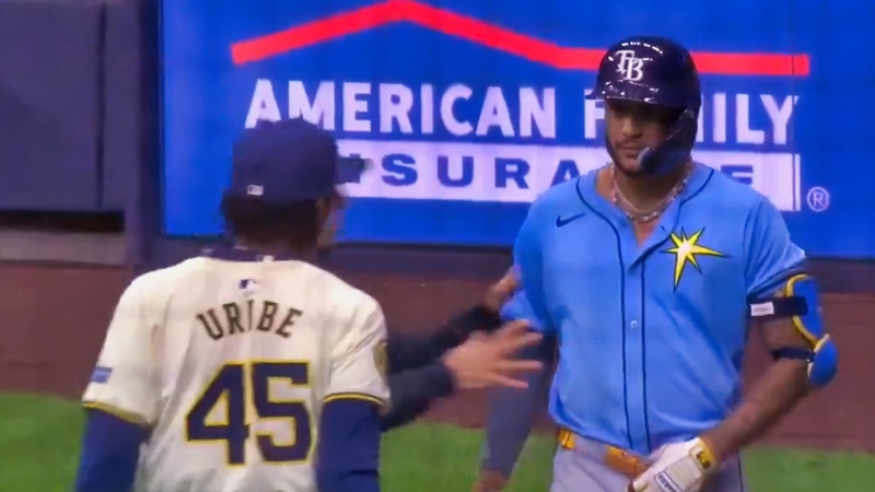 José Siri of Tampa Bay Rays (right) and Abner Uribe of Milwaukee Brewers (left) stare down.