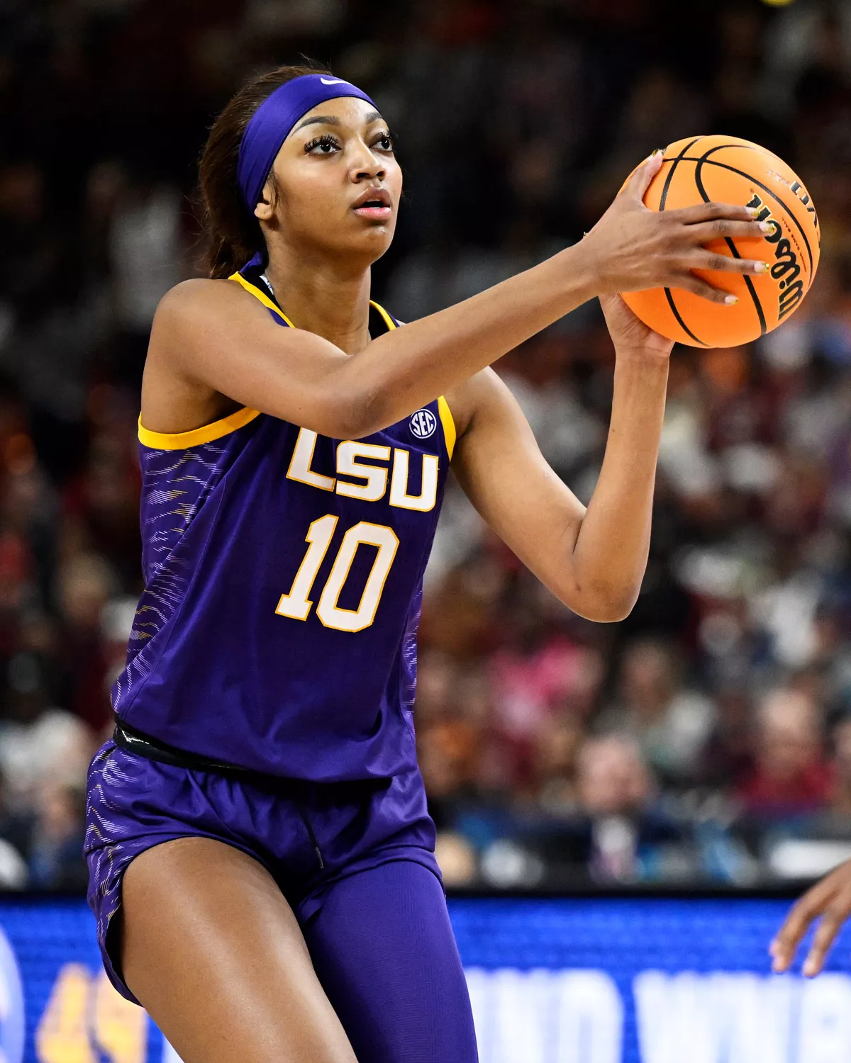 Angel Reese #10 of the LSU Lady Tigers shoots a basket against Sania Feagin #20 of the South Carolina Gamecocks in the second quarter during the championship game of the SEC Women's Basketball Tournament at Bon Secours Wellness Arena on March 10, 2024