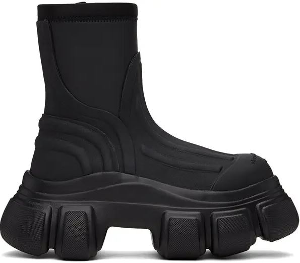 Janet wore a pair of £775 Alexander Wang Storm Chelsea Boots to drive her Range Rover