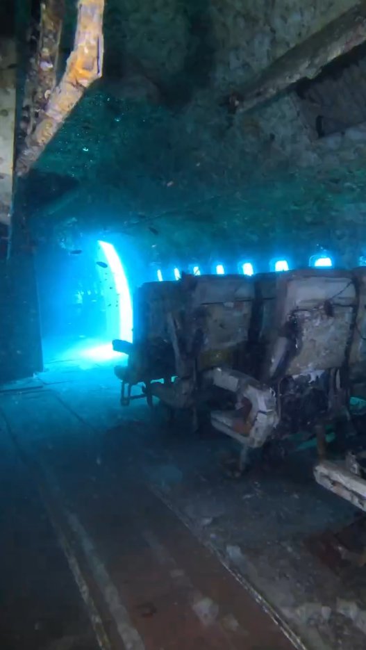 Photo showing rotten seats inside the sunken passenger plane