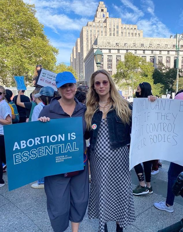 Schumer and Lawrence posed for a picture at the Women’s March protest in Washington DC in October of 2021