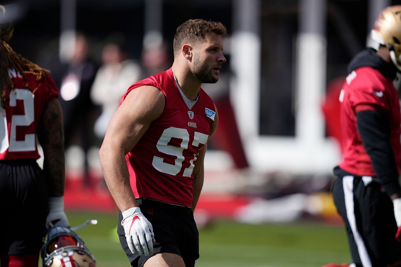 San Francisco 49ers defensive end Nick Bosa (97) warms up during a...