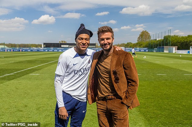 David Beckham made a happy return to Paris Saint-Germain as he met up with their players